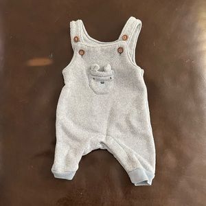 Gender neutral soft newborn sized overalls in light blue!
